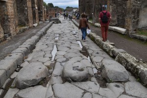 Street in Pompeij with Stone block to cross